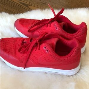 Bright red Nike’s.